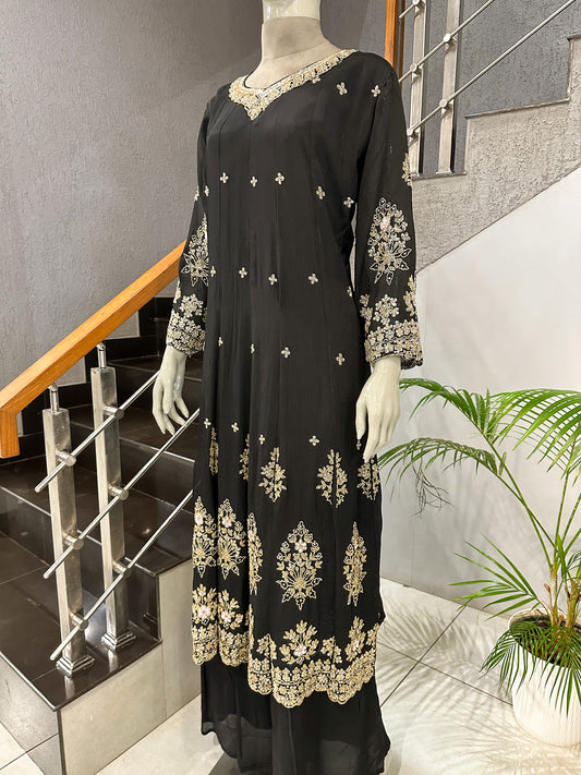 Bold black. Royal gold embroidery. Pure statement elegance 🖤✨