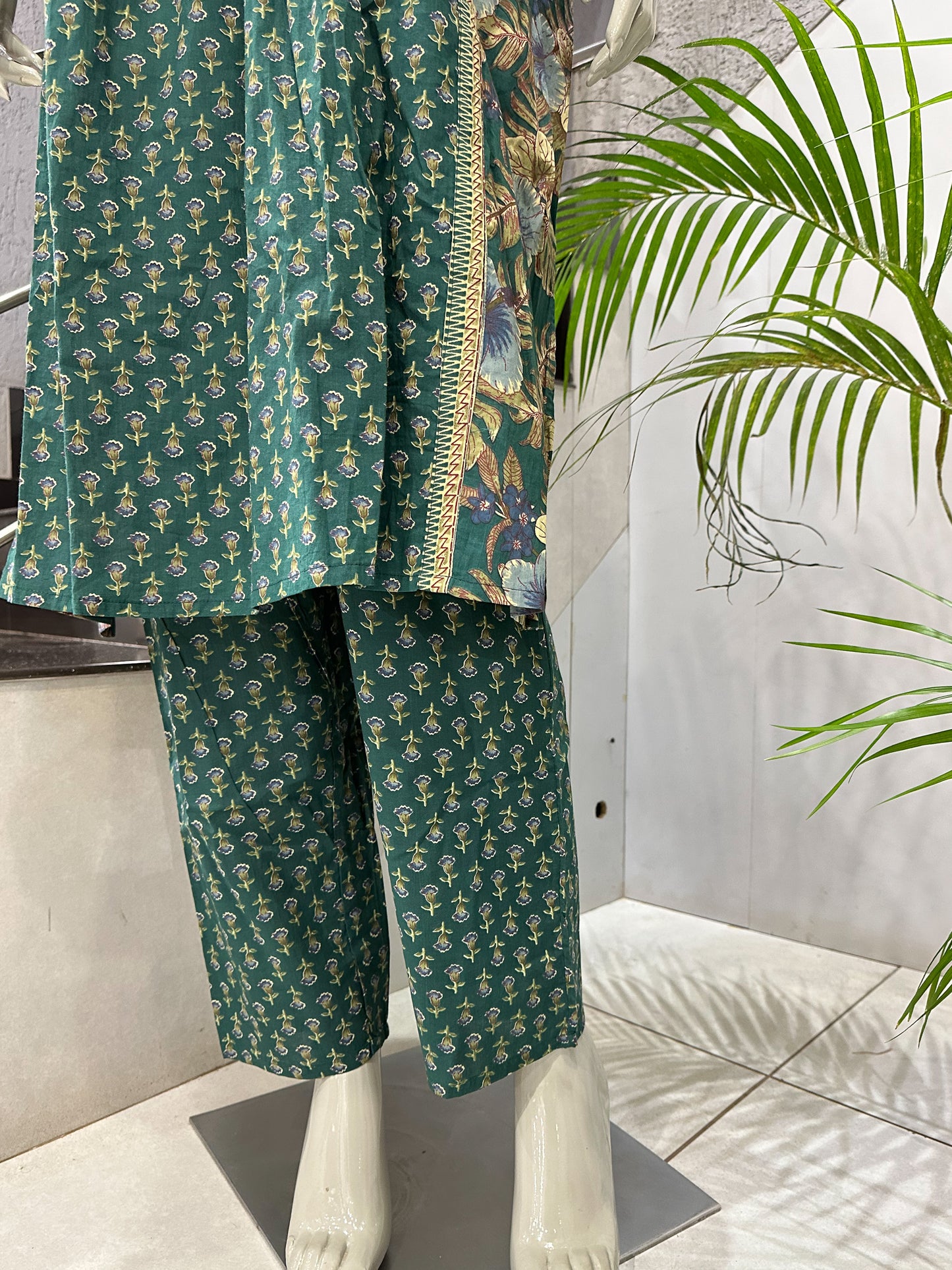Elegant Green Cotton Churidar Set with Floral Dupatta & Pintuck Kurta Design