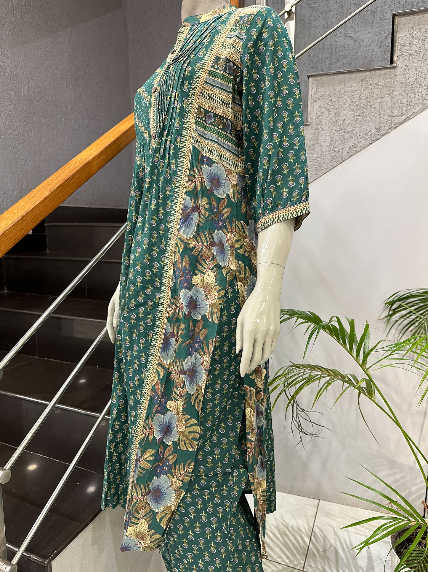 Elegant Green Cotton Churidar Set with Floral Dupatta & Pintuck Kurta Design