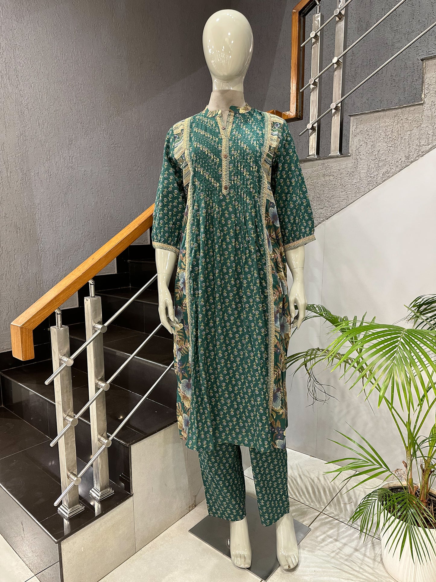 Elegant Green Cotton Churidar Set with Floral Dupatta & Pintuck Kurta Design