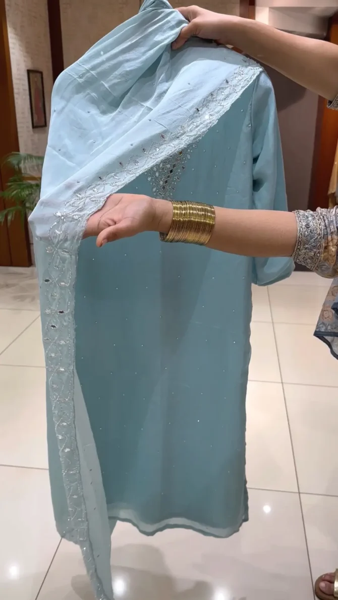 Elevate Your Wardrobe with Our Sky Blue Chinon Fabric Churidar