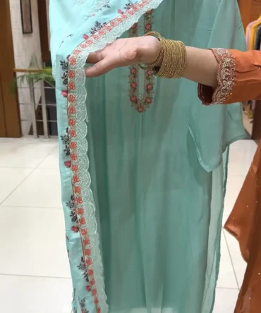 Elevate Your Wardrobe with Our Aqua Muslin Churidar Set